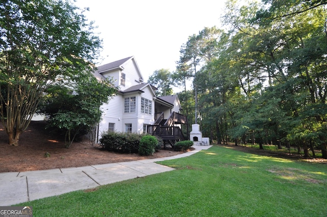 1070 Lexington Ct, Bishop, GA 30621 - view of grassy yard featuring a wooden deck and stairs