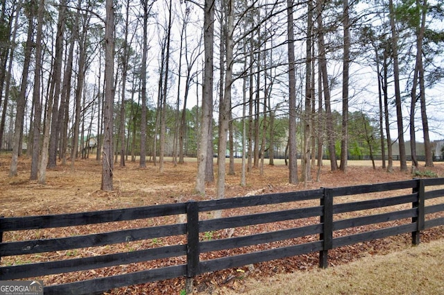 view of gate with fence