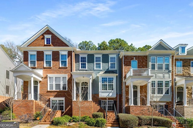 view of front of property featuring brick siding