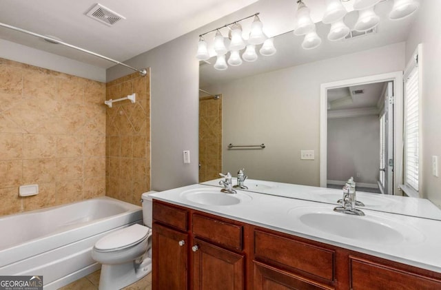 bathroom featuring double vanity, visible vents, shower / bathtub combination, and a sink