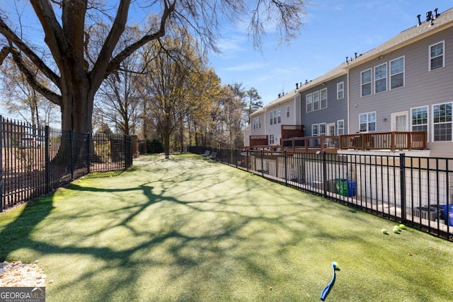 view of yard with a residential view and fence