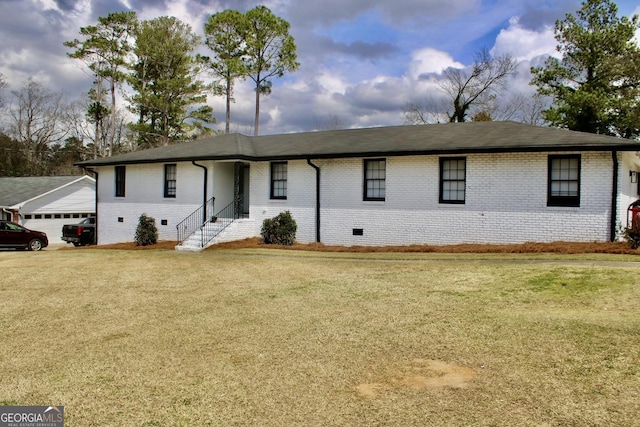 ranch-style home featuring crawl space, a front lawn, and brick siding