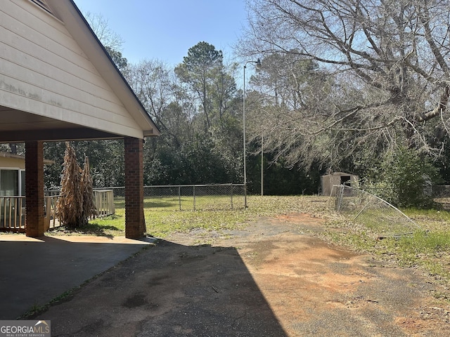 view of yard with a patio area and fence