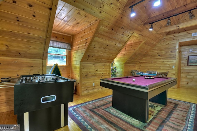 playroom featuring wood finished floors, wood ceiling, wood walls, and vaulted ceiling