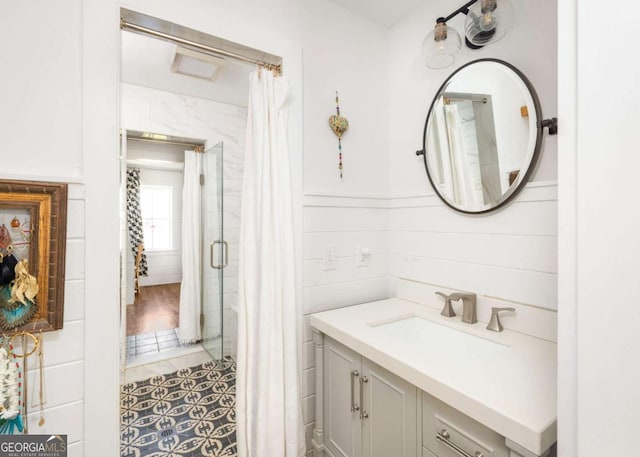 bathroom featuring tile patterned floors, vanity, and a shower with shower curtain