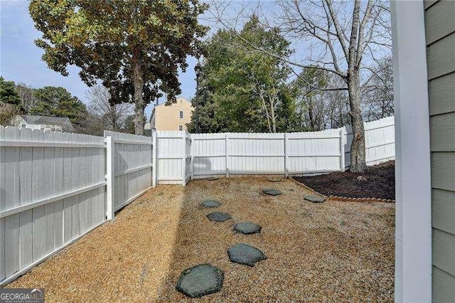 view of yard featuring a fenced backyard