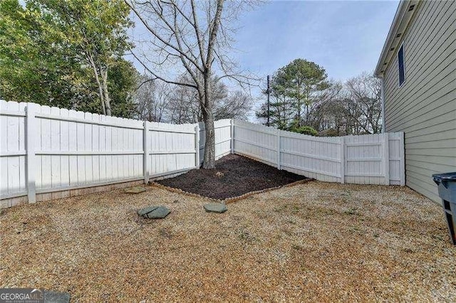 view of yard featuring a fenced backyard