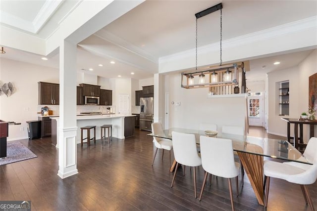 dining area with recessed lighting, baseboards, dark wood-type flooring, and crown molding