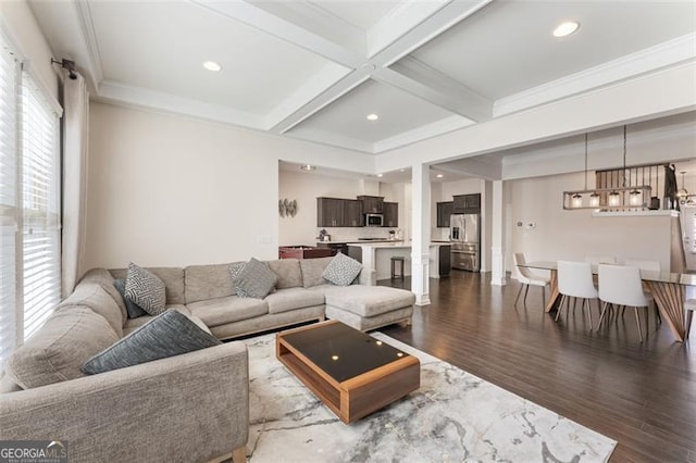 living area featuring dark wood-style floors, beamed ceiling, recessed lighting, and coffered ceiling