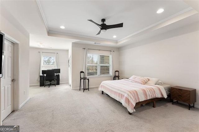 bedroom with recessed lighting, baseboards, a raised ceiling, and ornamental molding