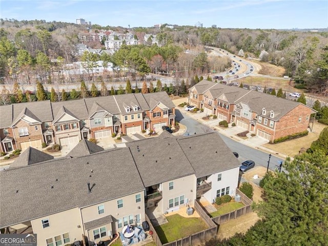 birds eye view of property with a residential view