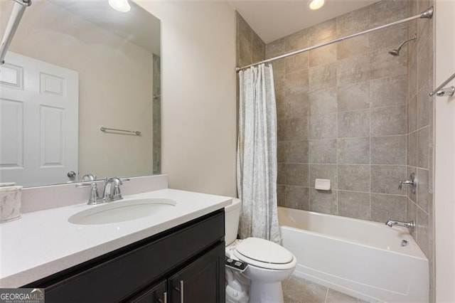 full bathroom featuring shower / bathtub combination with curtain, toilet, vanity, and tile patterned flooring