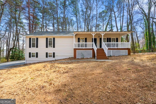 ranch-style house with covered porch