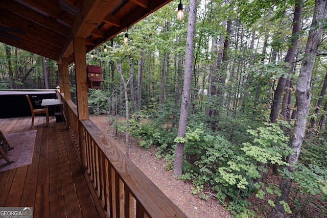 deck featuring a view of trees
