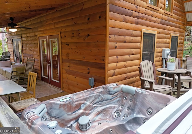 interior space featuring an outdoor hot tub