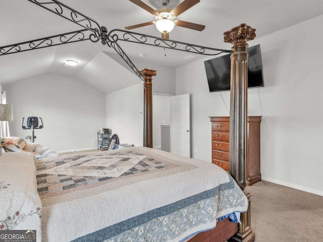 carpeted bedroom featuring lofted ceiling, baseboards, and ceiling fan