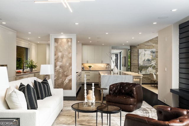 living room featuring wood finished floors and recessed lighting