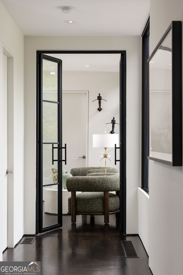 entryway with visible vents and wood finished floors