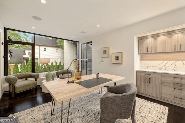 office area with recessed lighting and dark wood-style floors