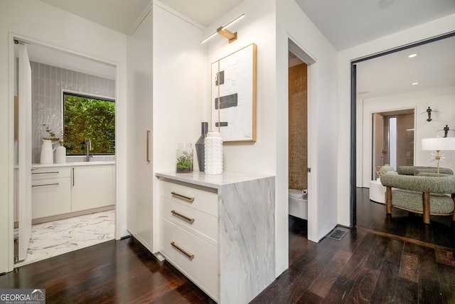 interior space featuring recessed lighting and wood finished floors