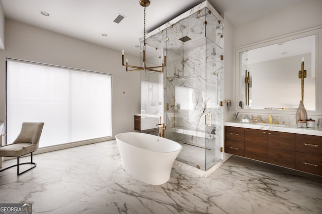 bathroom featuring vanity, a soaking tub, marble finish floor, and a marble finish shower