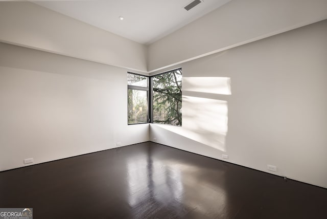 spare room featuring visible vents