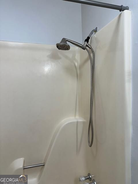 details with shower / washtub combination