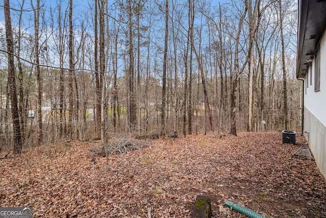 view of yard featuring central AC unit