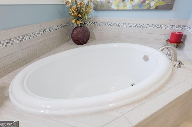 full bath featuring a garden tub