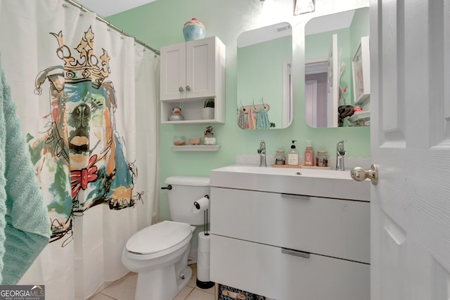 bathroom with vanity, tile patterned floors, toilet, and visible vents