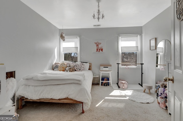 bedroom featuring carpet and visible vents