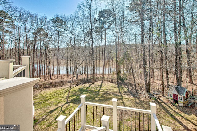 exterior space with a forest view