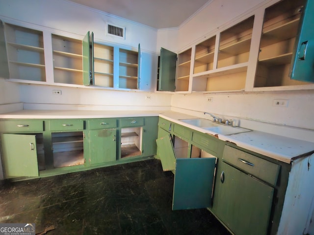 kitchen featuring crown molding, light countertops, green cabinets, and open shelves