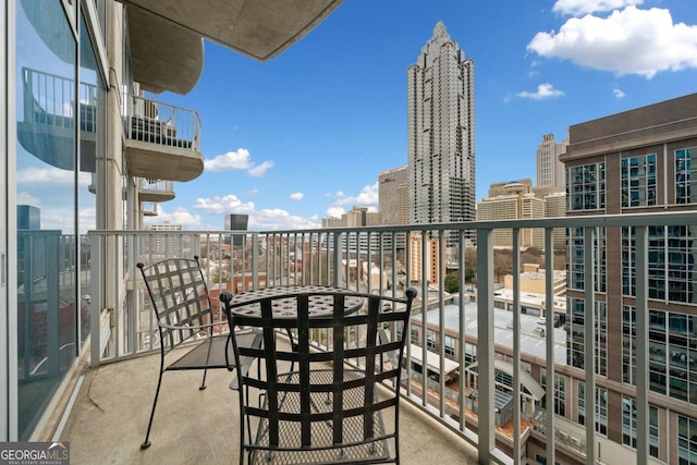 balcony featuring a view of city