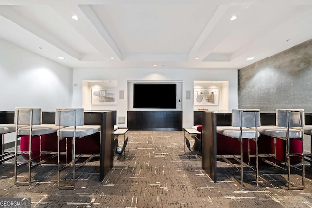 interior space featuring a raised ceiling, a dry bar, and recessed lighting