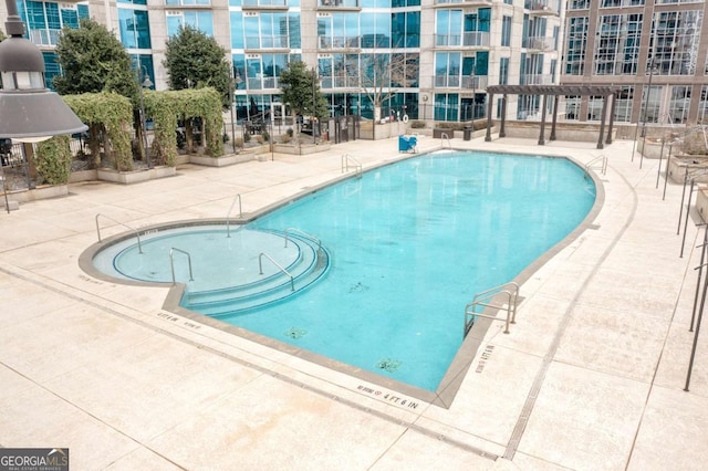 pool featuring a patio