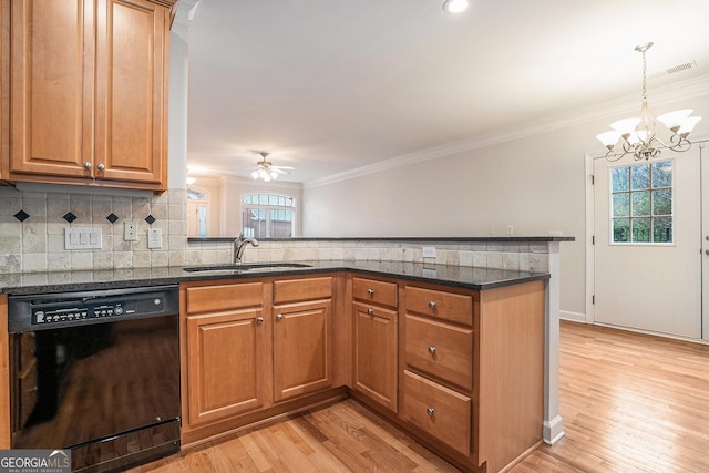 kitchen with a sink, dishwasher, crown molding, brown cabinets, and backsplash