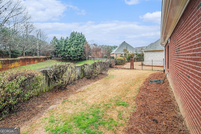 view of yard with fence