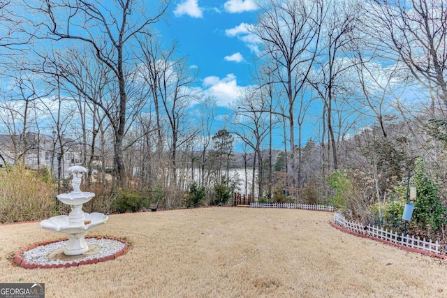 view of yard featuring fence