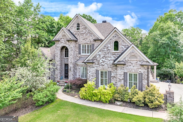 3845 Starboard Pt, Gainesville, GA 30506 - view of front of property with brick siding and a front lawn