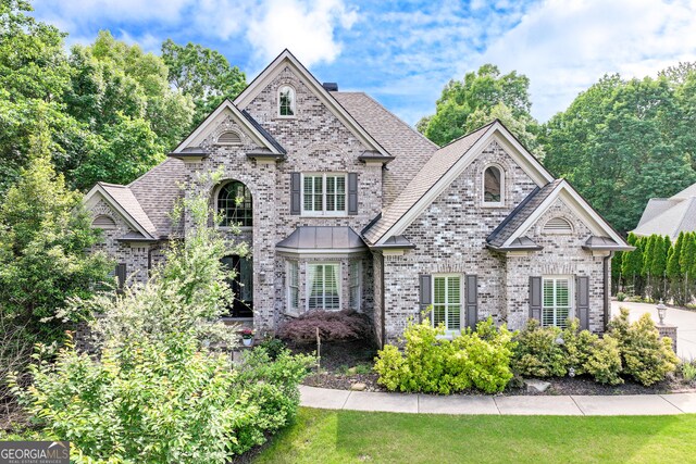 3845 Starboard Pt, Gainesville, GA 30506 - view of front facade with brick siding and roof with shingles