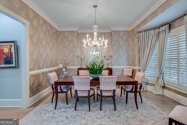 3845 Starboard Pt, Gainesville, GA 30506 - dining area with a chandelier, wallpapered walls, wood finished floors, and ornamental molding