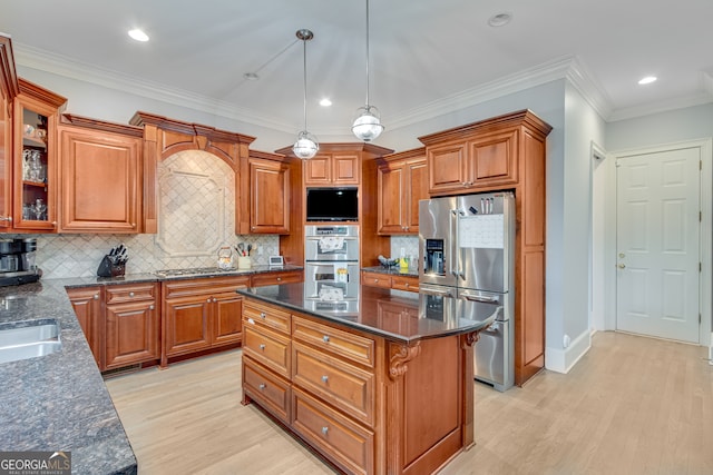 3845 Starboard Pt, Gainesville, GA 30506 - kitchen with appliances with stainless steel finishes, brown cabinets, light wood-style floors, recessed lighting, and crown molding