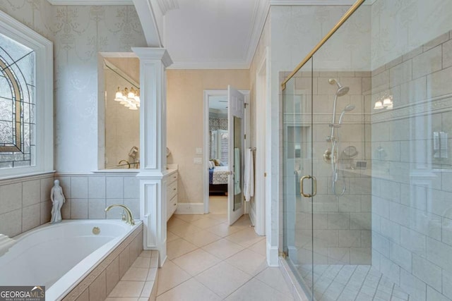 ensuite bathroom featuring wallpapered walls, crown molding, decorative columns, and ensuite bathroom