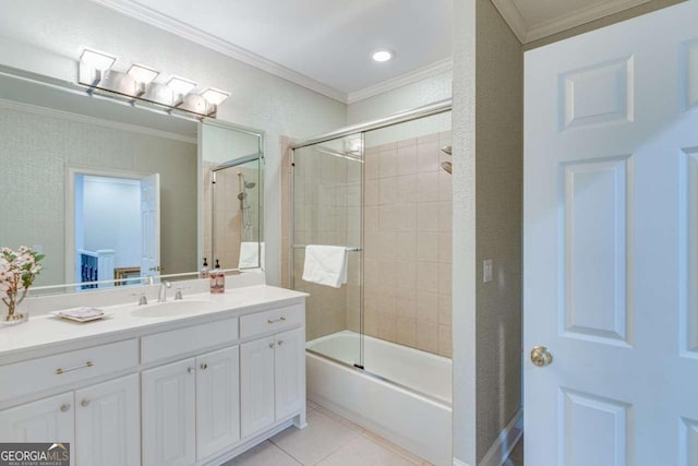 full bath with enclosed tub / shower combo, vanity, crown molding, and tile patterned flooring