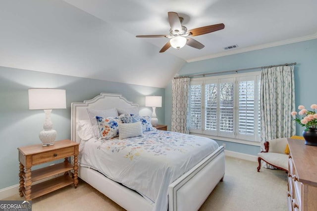 carpeted bedroom featuring visible vents, crown molding, ceiling fan, baseboards, and lofted ceiling