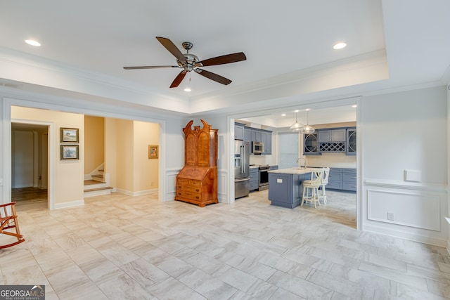 3845 Starboard Pt, Gainesville, GA 30506 - living area with a ceiling fan, a tray ceiling, stairway, ornamental molding, and recessed lighting