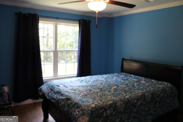 3801 Gold Leaf Ct, Stockbridge, GA 30281 - bedroom featuring ornamental molding, wood finished floors, and a ceiling fan
