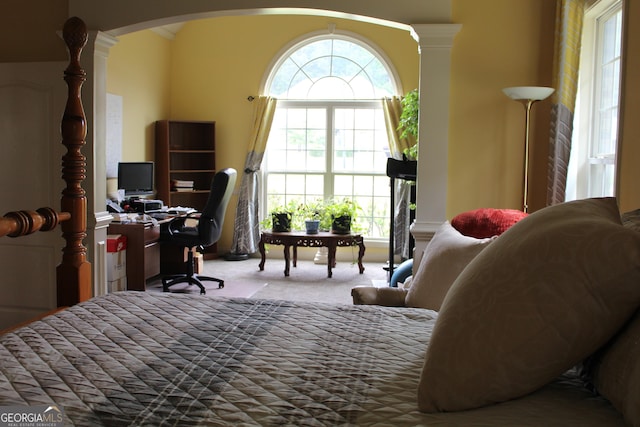 3801 Gold Leaf Ct, Stockbridge, GA 30281 - carpeted bedroom with arched walkways, an office area, and ornate columns