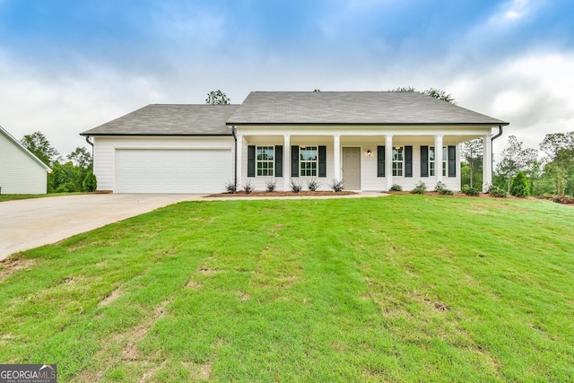 view of front of house with a garage, a front yard, covered porch, and driveway